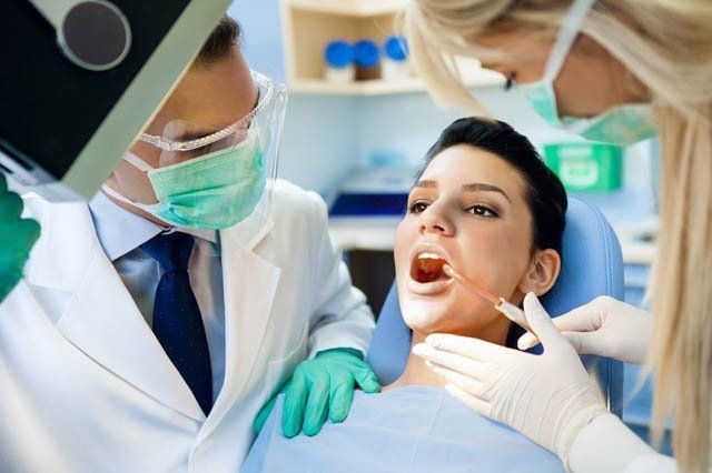 draining mouth dental assistant draining mouth with suction hose