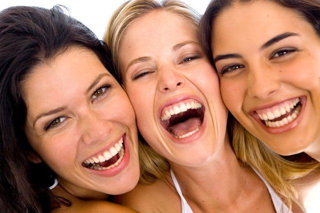 young happy girls smiling