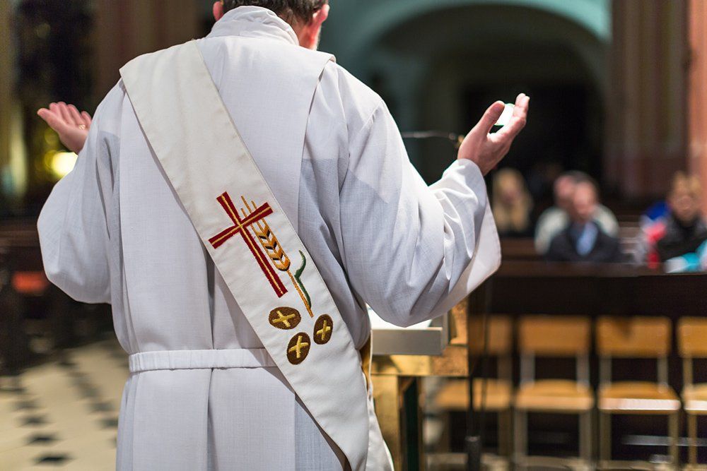 Priest at Podium — Saint John, IN — Boric Religious Gift