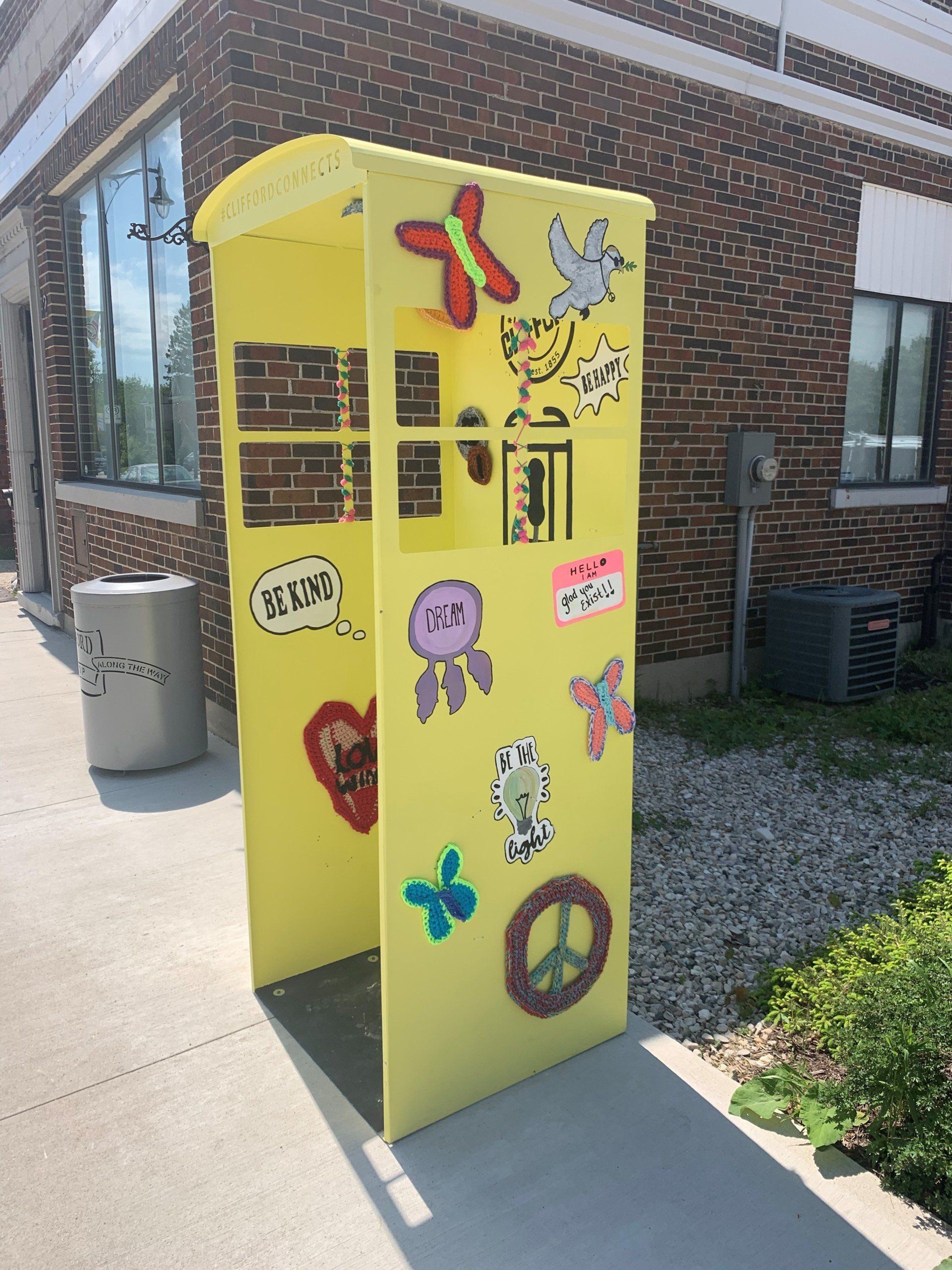 This booth was made for talking” mural – interactive art installation - yellow booth side