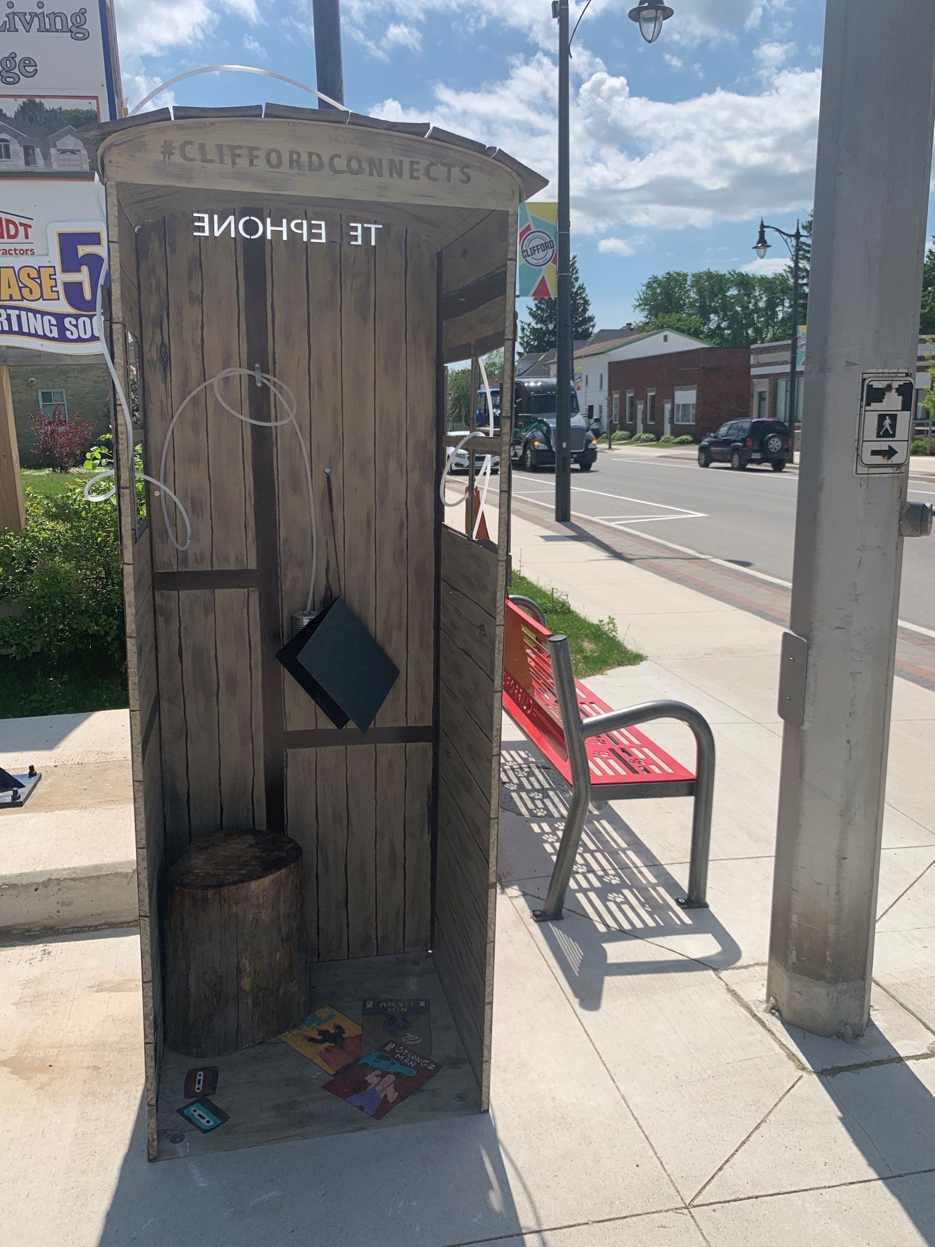 This booth was made for talking” mural – interactive art installation - wooden booth front