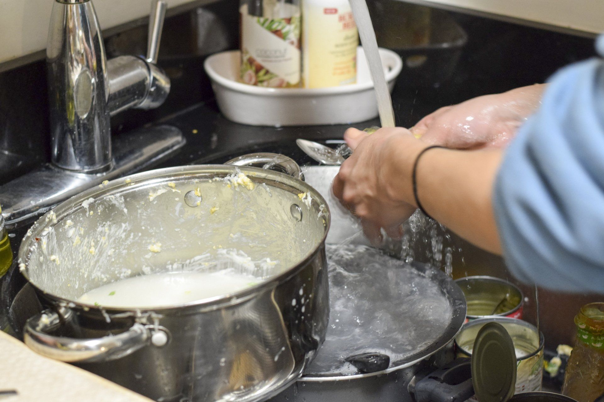 Washing Dishes in Kitchen