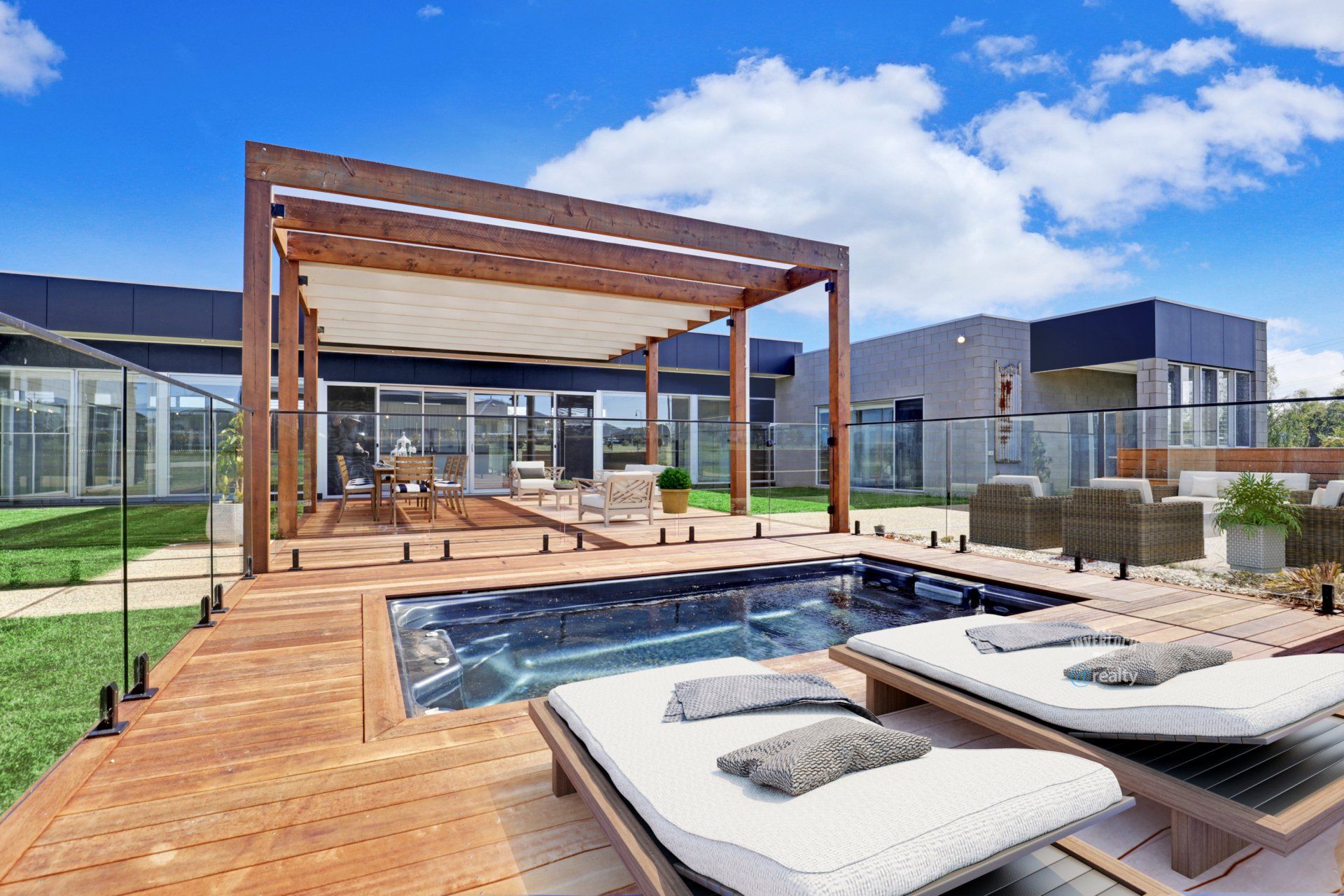 An artist 's impression of a house with a swimming pool and a pergola.