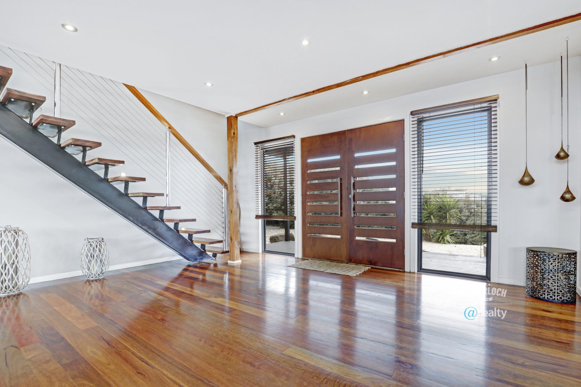 There is a staircase in the middle of the room.