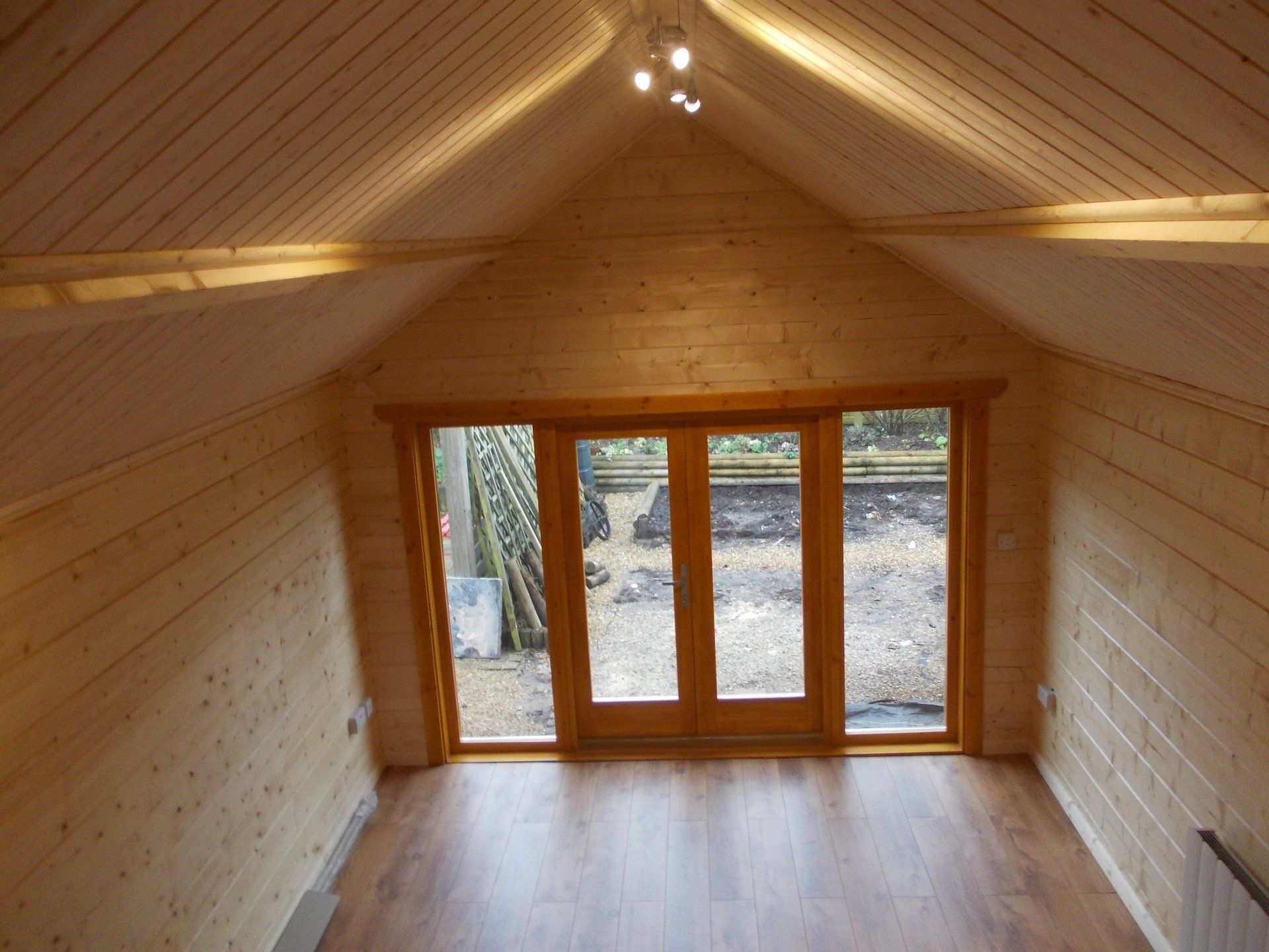 double doors on a residential log cabin