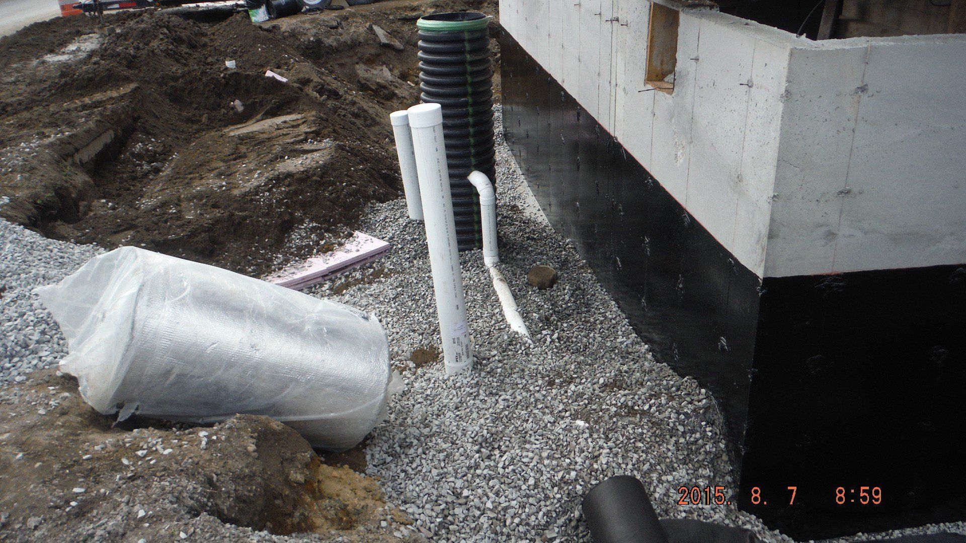 travaux de remblai au-dessus d'un drain fancais