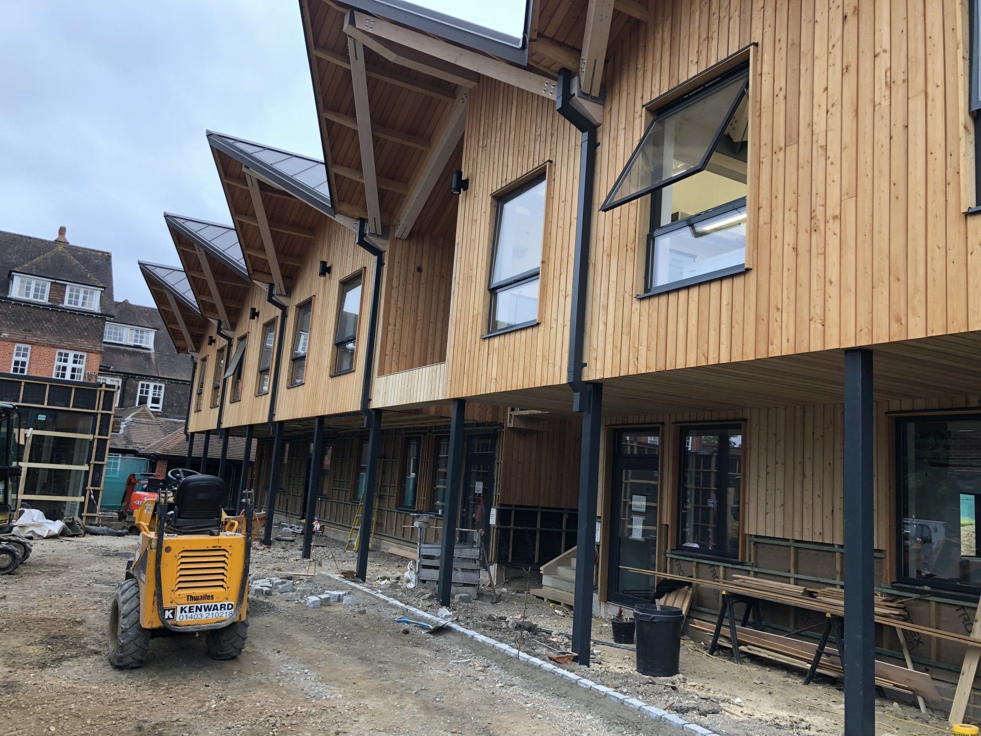 Cedar cladding, school classrooms, Cranleigh, Surrey. Builder. Building contractor. Construction. Carpentry. Carpentry contractor. Extensions. New builds. Timber frame fabrication and erection. Design and build. Kitchen installations. Horsham. Surrey. Reigate. Redhill. Dorking. Crawley. West Sussex. Cranleigh.