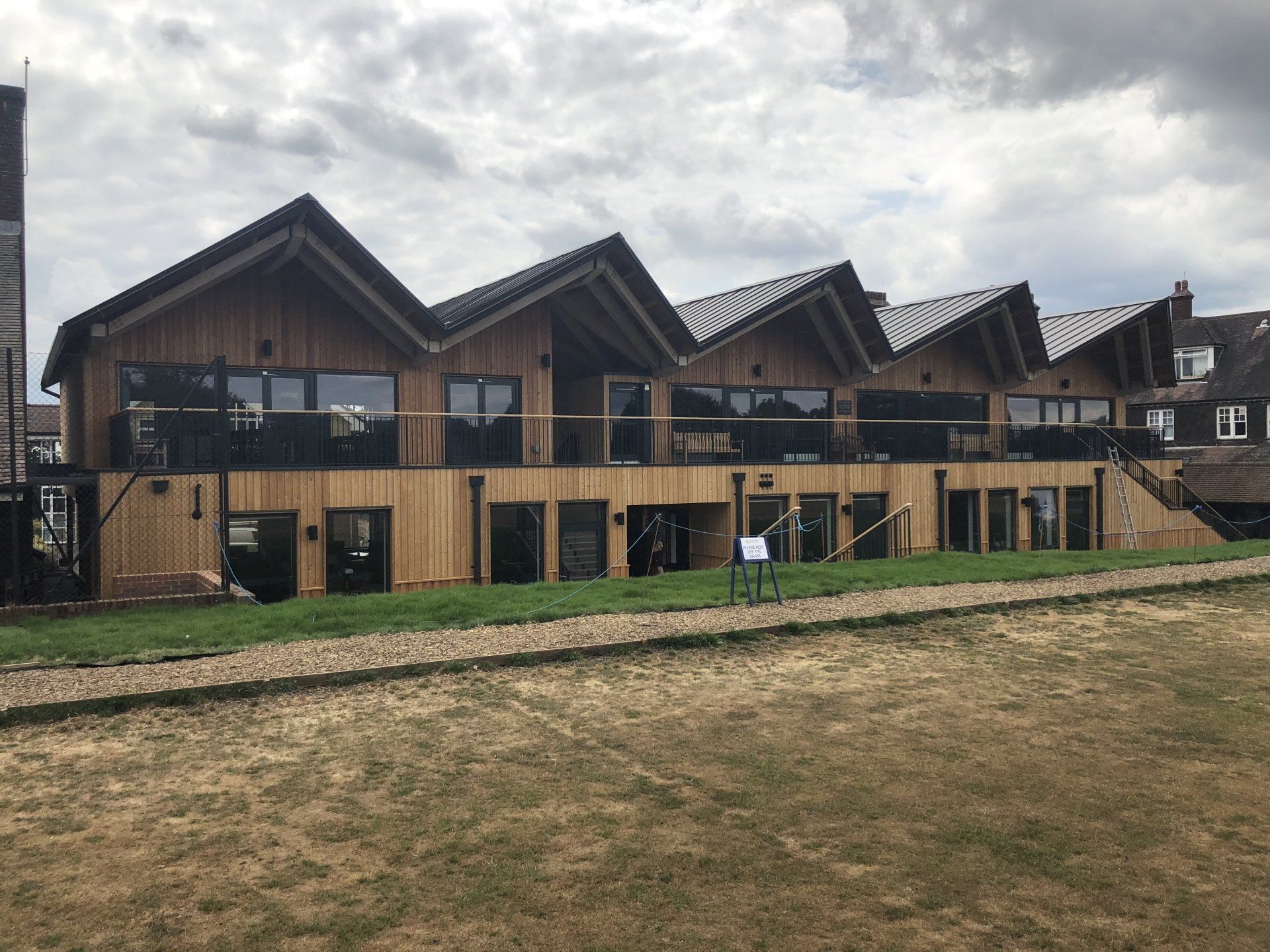 Cedar cladding, school classrooms, Cranleigh, Surrey. Builder. Building contractor. Construction. Carpentry. Carpentry contractor. Extensions. New builds. Timber frame fabrication and erection. Design and build. Kitchen installations. Horsham. Surrey. Reigate. Redhill. Dorking. Crawley. West Sussex. Cranleigh.