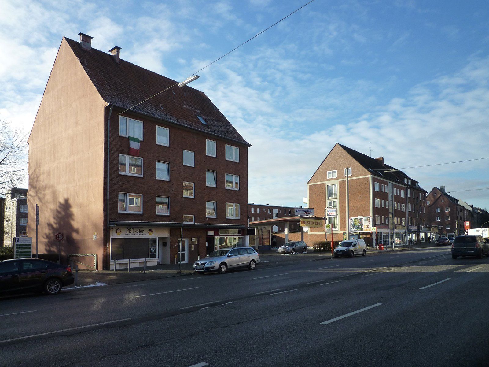 Visualisierung Fotomontage von einer Lückenbebauung in Hamburg: Vergleich vorher und nachher.