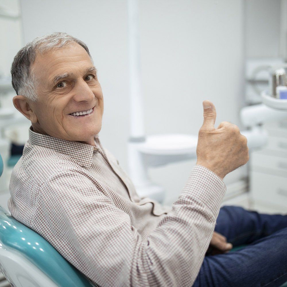 Senior Giving a Thumbs Up — Hickory, NC — McDonald Family Dentistry