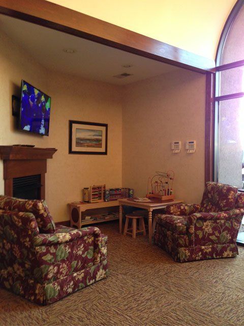 Sofa and Flat TV on Lobby — Hickory, NC — McDonald Family Dentistry