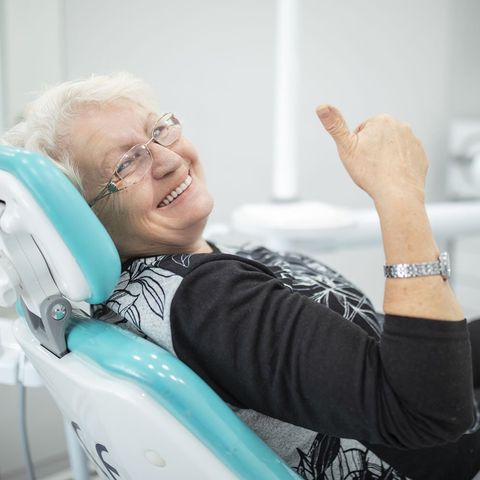 Happy Old Woman Giving a Thumbs Up — Hickory, NC — McDonald Family Dentistry Happy Old Woman Giving a Thumbs Up — Hickory, NC — McDonald Family Dentistry