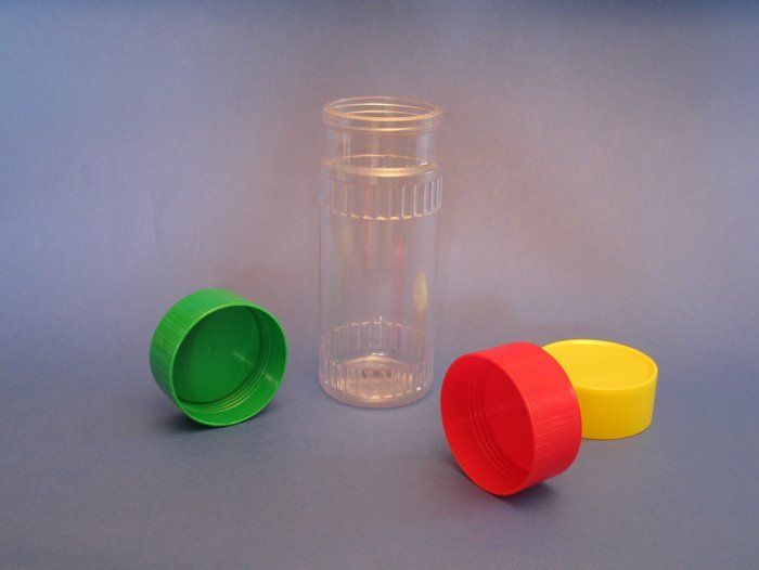 PVC container with colored caps