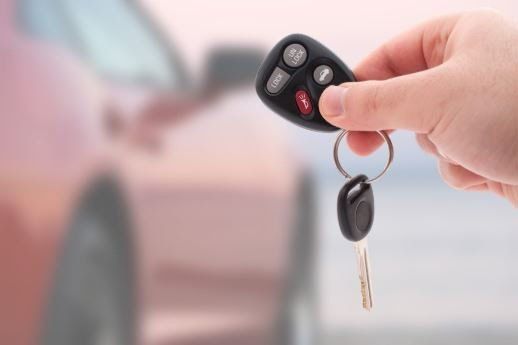 Hand with a Car Key — Livonia, MI — Charles J Schneider PC Hand with a Car Key — Livonia, MI — Charles J Schneider PC