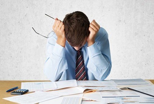 A Man Having a Headache — Livonia, MI — Charles J Schneider PC