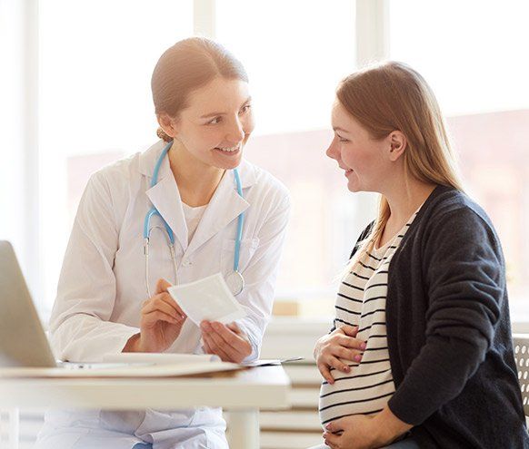 Pregnant Woman at Doctors Office — Benton County Health Department — Warsaw, MO Pregnant Woman at Doctors Office — Benton County Health Department — Warsaw, MO