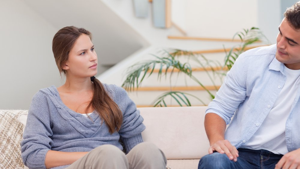 Young couple in serious conversation