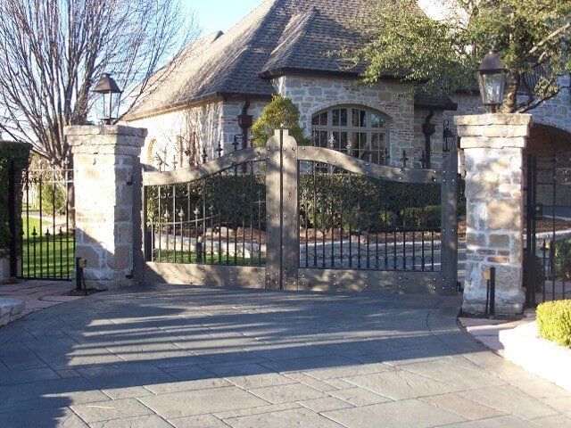 Steel gate in front of house - Custom gate fabrications in Plano, TX