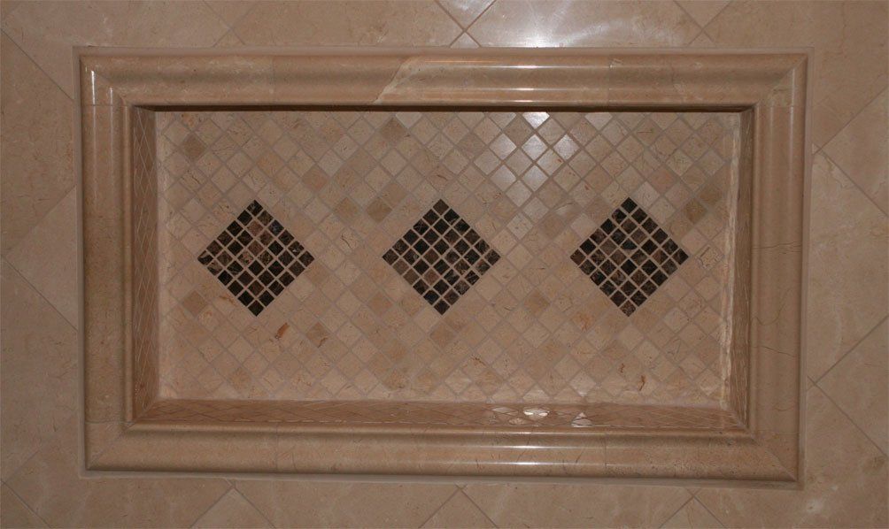 Custom tiled shower niche installation detail
