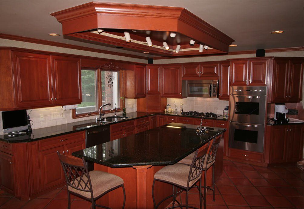 Luxury granite kitchen island and perimeter countertop installation