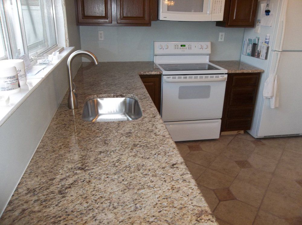 Granite kitchen countertop with peninsula and sink