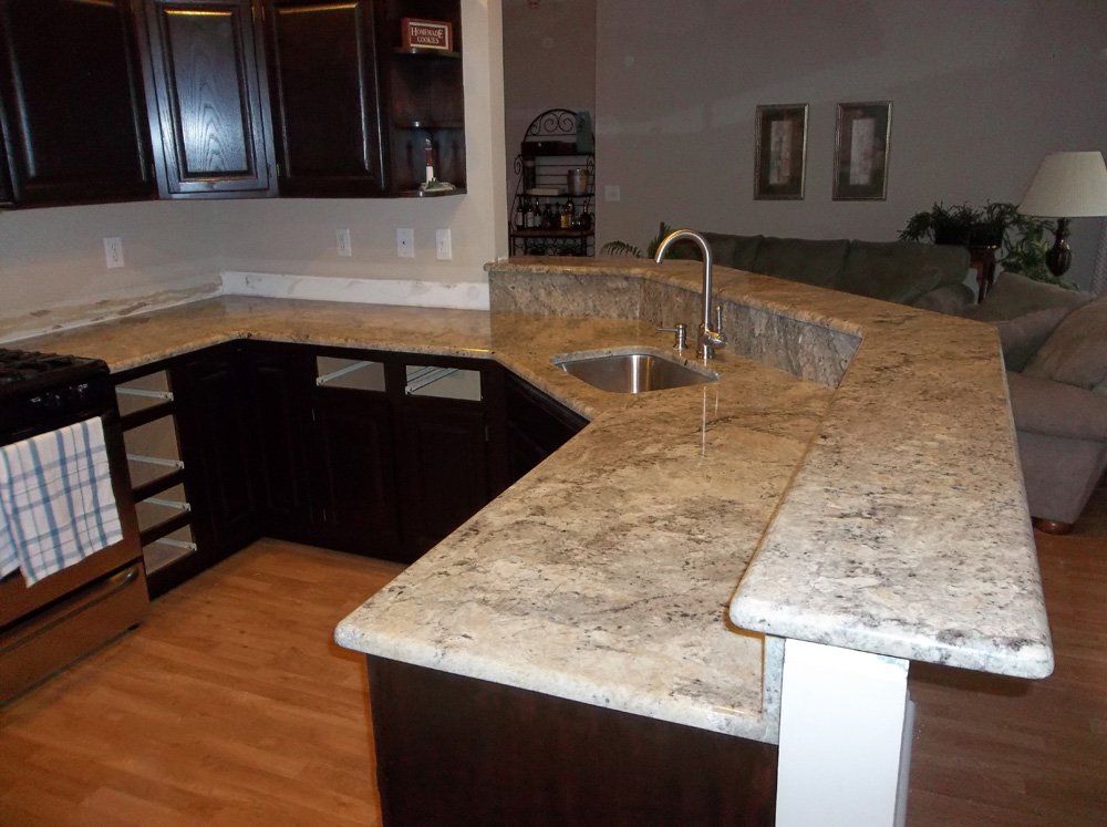 Kitchen countertop installation with raised bar seating