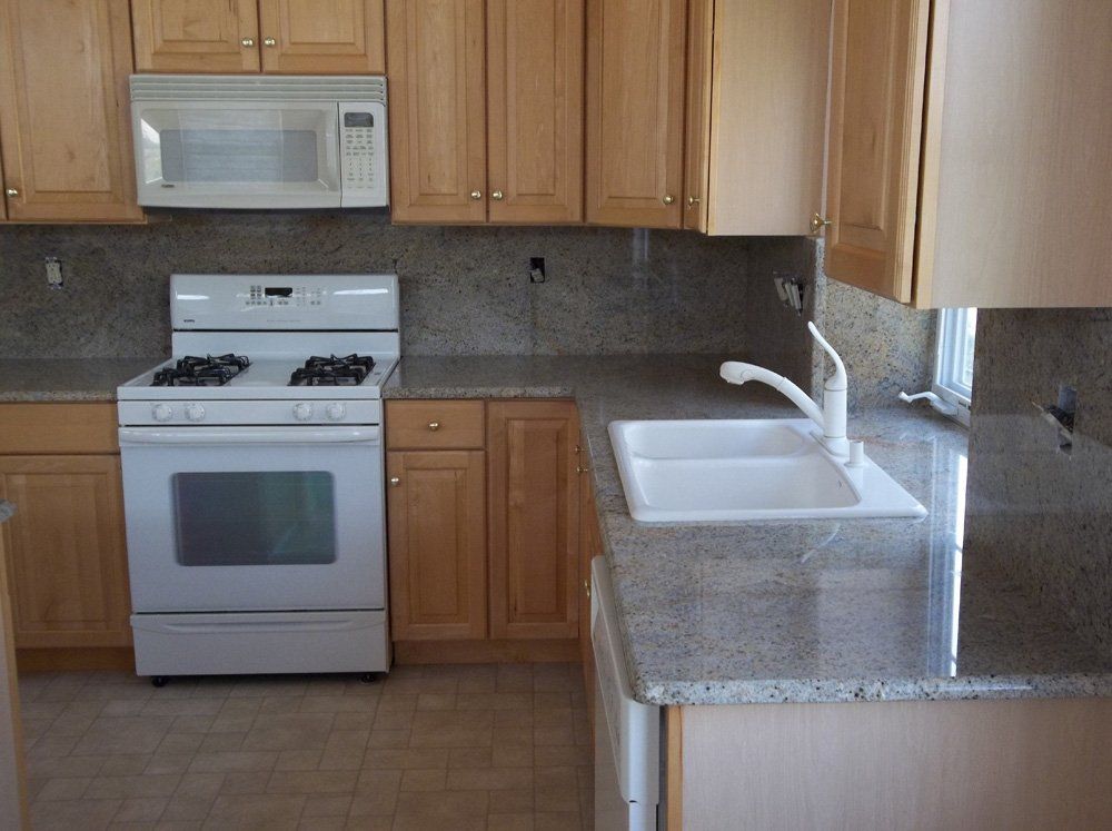 Installed granite kitchen countertop with backsplash