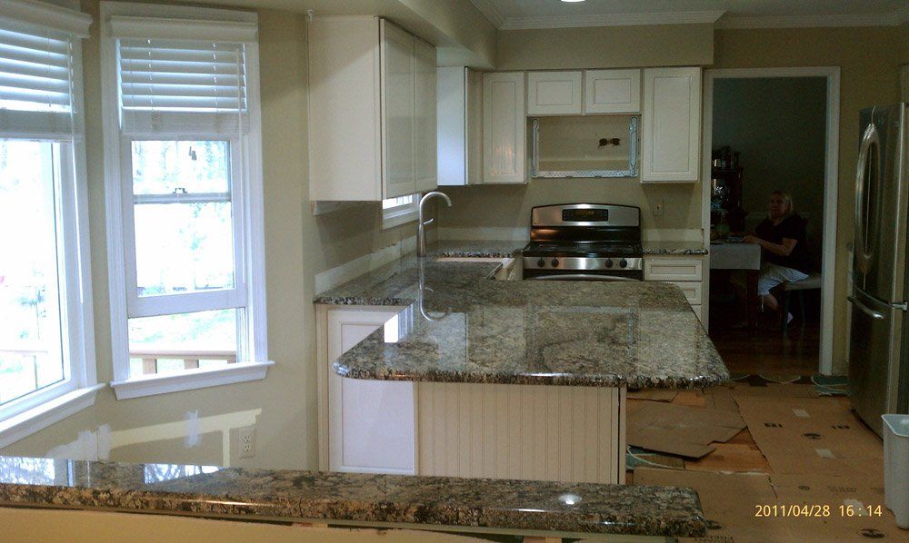 Installed granite kitchen countertop with center island