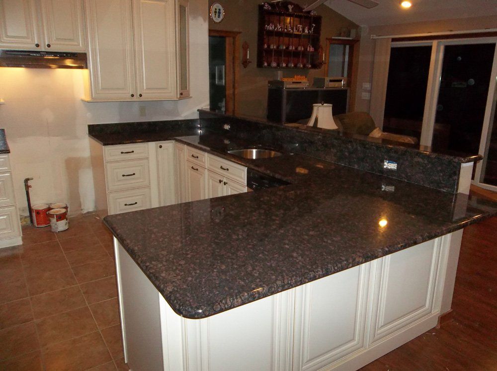 Tan brown granite kitchen island countertop installation