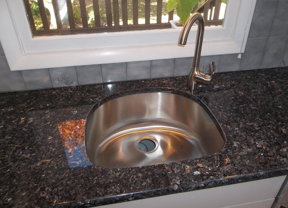 Granite countertop installation with undermount sink