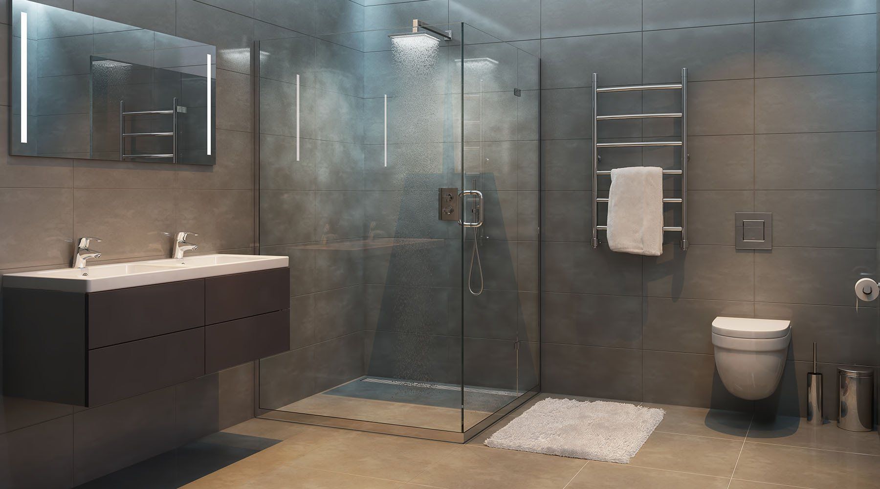 Modern bathroom with gray tile, shower, vanity, toilet, and towel warmer.