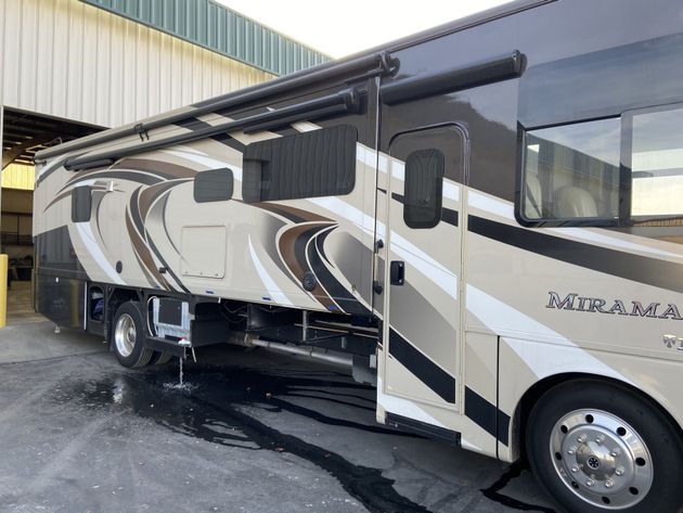 White Mini Bus — RV Service in West Jordan, UT