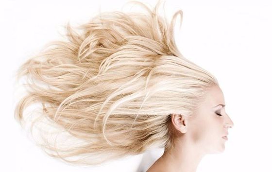 Woman with new hair colour as an example of our hair treatments in Onalaska, WI