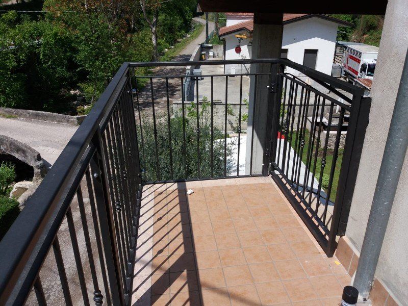 pianerottolo con ringhiera