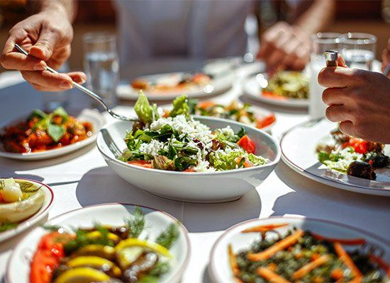 Couple Eating Lunch — Newtown, PA — Piccolo Trattoria Italian Catering
