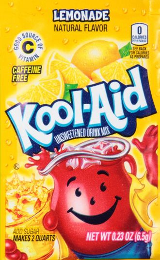 A yellow packet of Lemonade flavored Kool-Aid unsweetened drink mix featuring the Kool-Aid Man and a glass of lemonade.