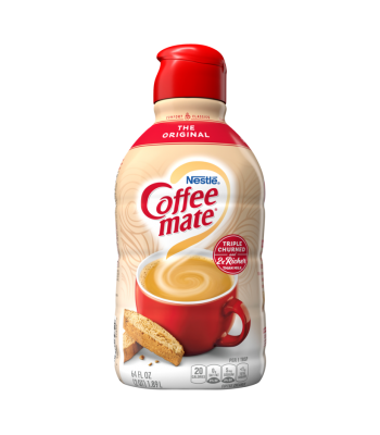 A 32 fl oz bottle of Nestle Coffee mate The Original coffee creamer with a red cap and a picture of coffee and biscotti.