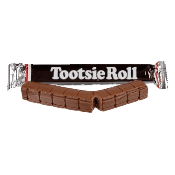 A segmented, V-shaped brown candy bar in front of its black and silver
