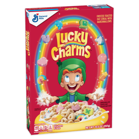 Box of Lucky Charms cereal featuring a cartoon leprechaun, a rainbow, and marshmallows over a bowl of cereal.