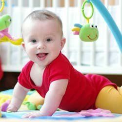 Infant Trying to Sit Up and Play at Daycare | Goffstown, NH | Educare Daycare & Learning Center Infant Trying to Sit Up and Play at Daycare | Goffstown, NH | Educare Daycare & Learning Center