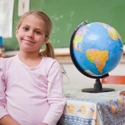 Little Girl Smiling and Learning at Daycare | Goffstown, NH | Educare Daycare & Learning Center Little Girl Smiling and Learning at Daycare | Goffstown, NH | Educare Daycare & Learning Center