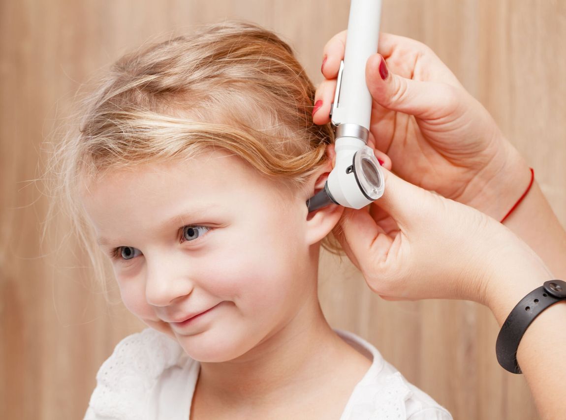 Child having hearing checked