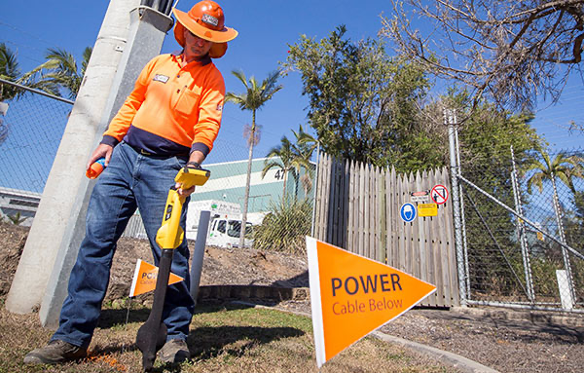 Man Holding A Radio Detector — Cable & Pipe Locations in Woolgoolga, NSW