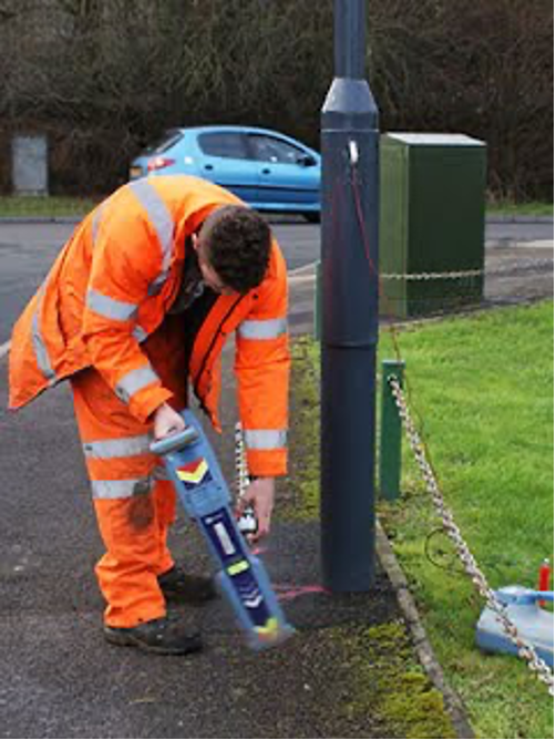 Construction Worker Using Cable Detecting Machine — Cable & Pipe Locations in Woolgoolga, NSW