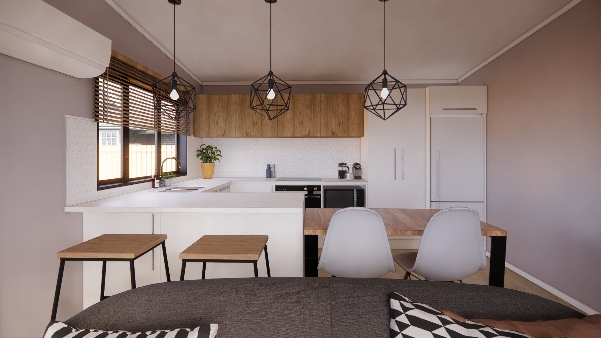 A living room with a table and chairs and a kitchen