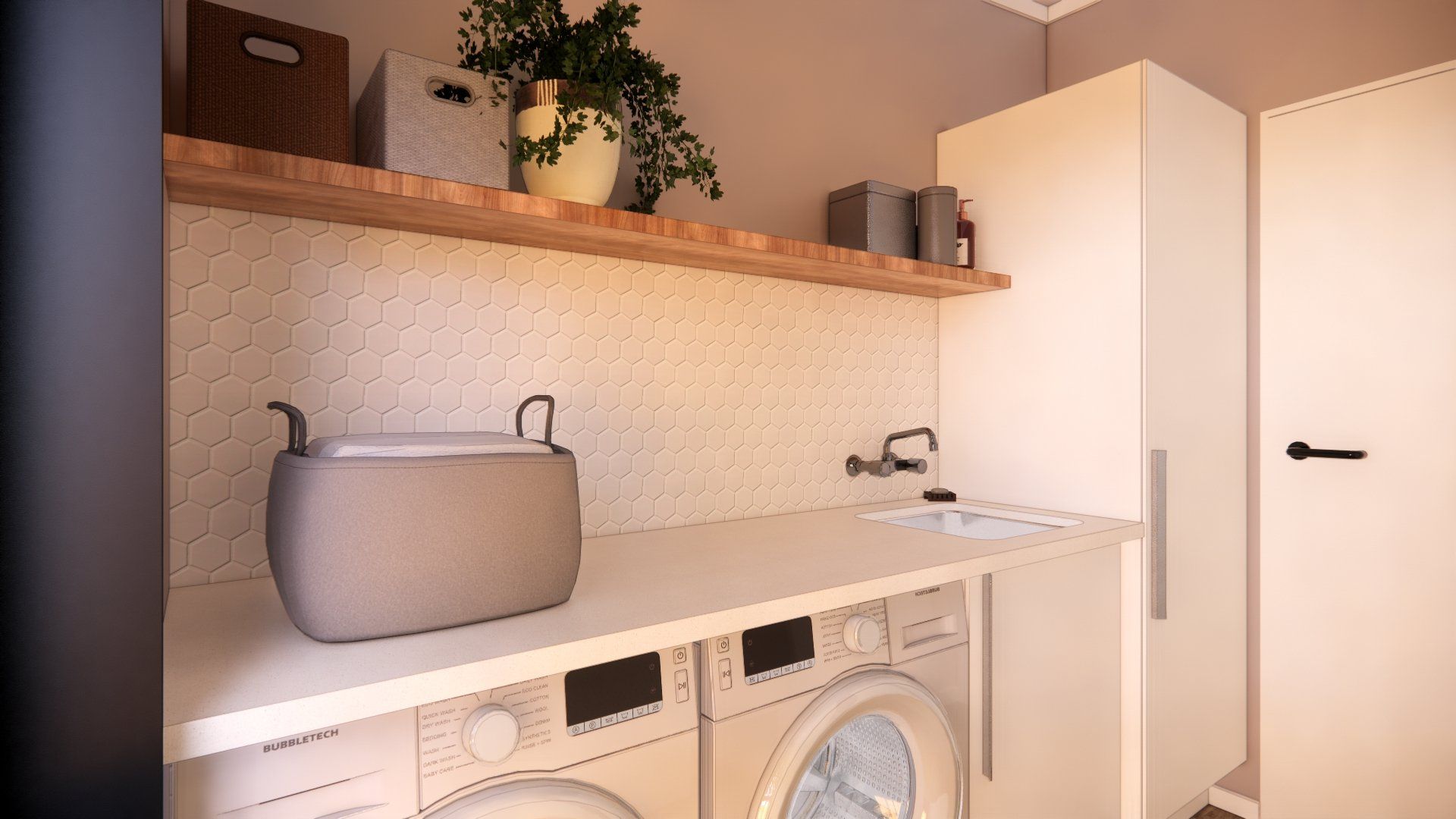 A laundry room with a sink , washer and dryer.