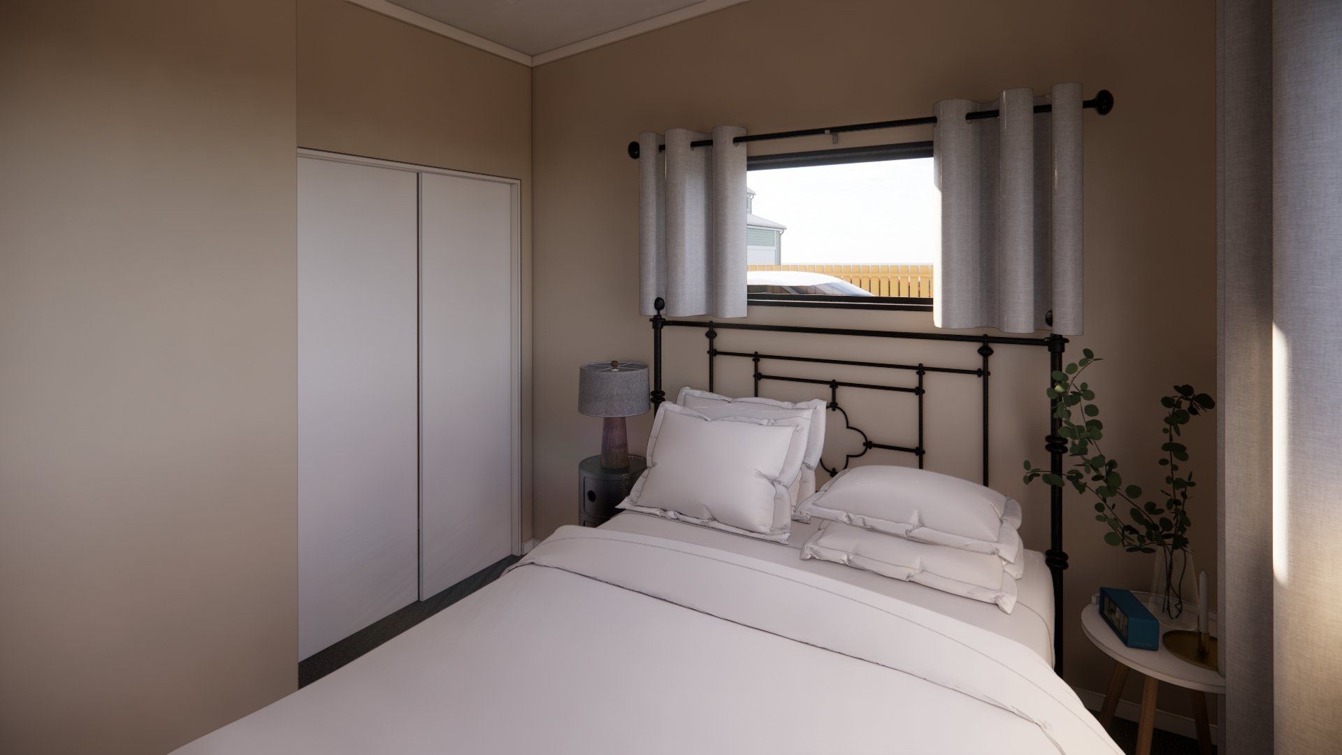 A bedroom with a bed and a window.