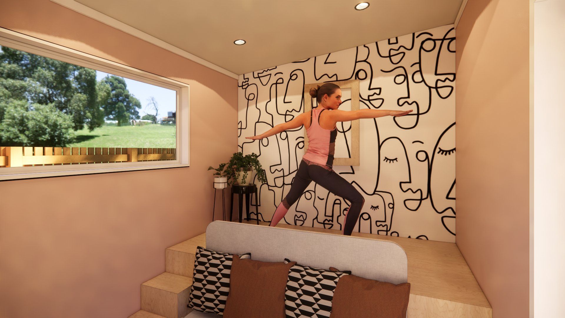 A woman is doing yoga in a room with a wall with faces on it.