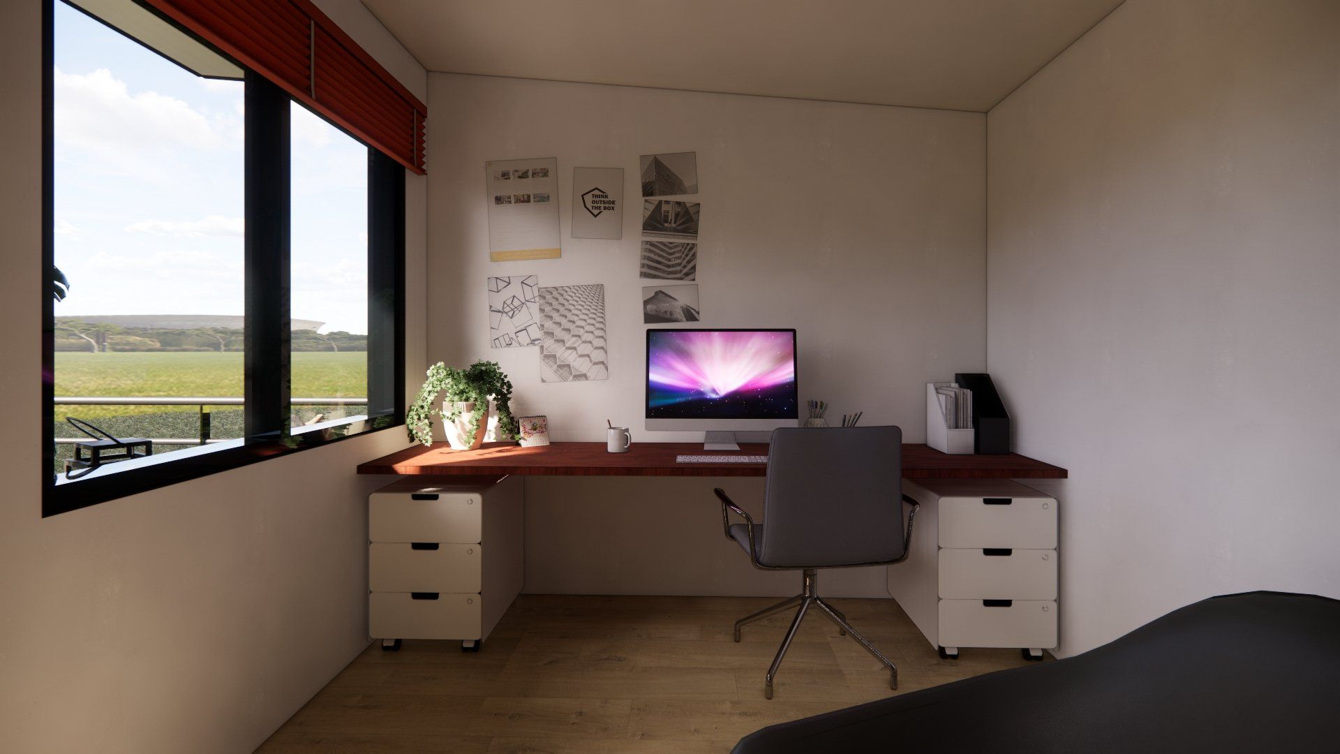 A computer is sitting on a desk in a room next to a window.