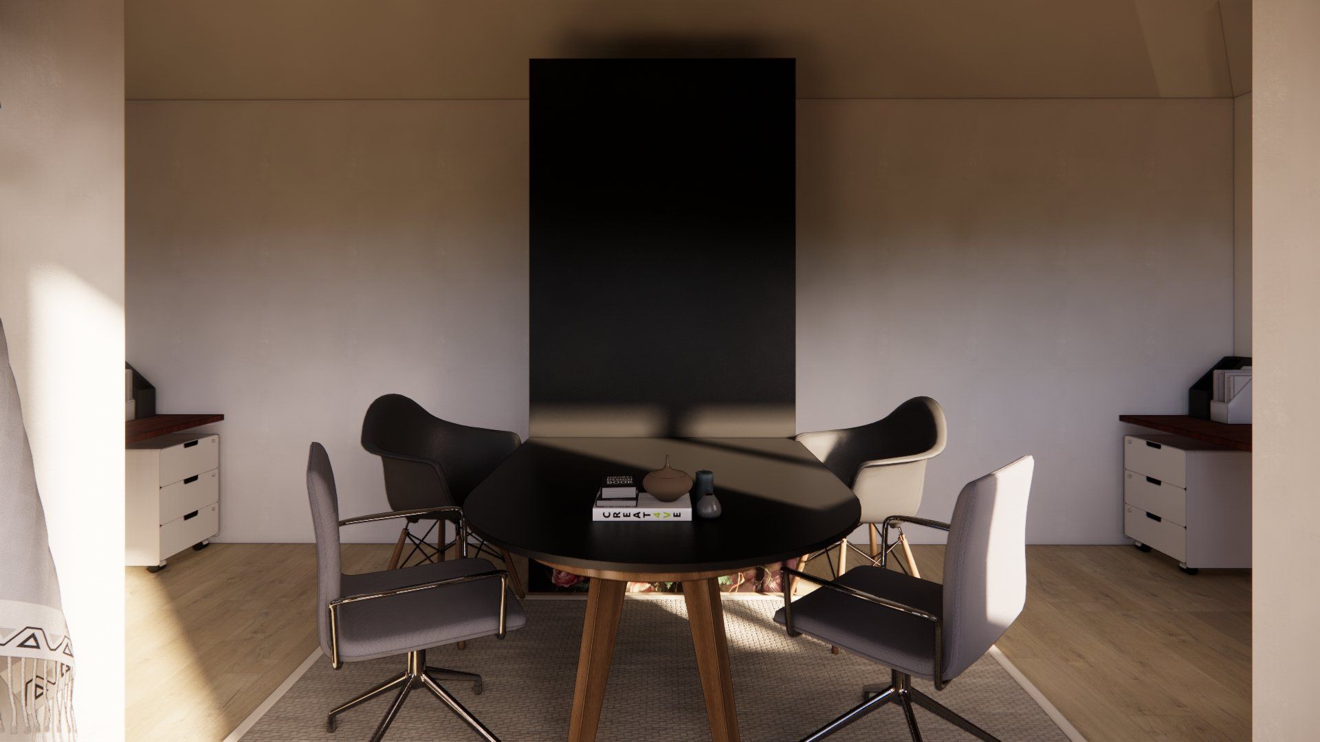 A conference room with a round table and chairs.